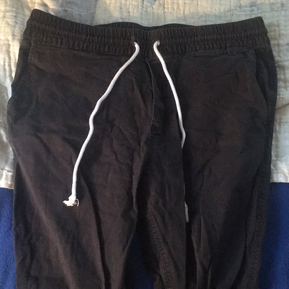 Black skinny joggers with zip up ankles